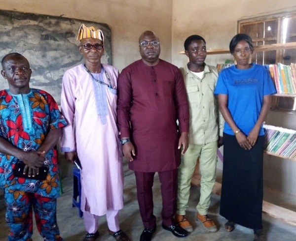NYSC Member Donates Library to Host Community